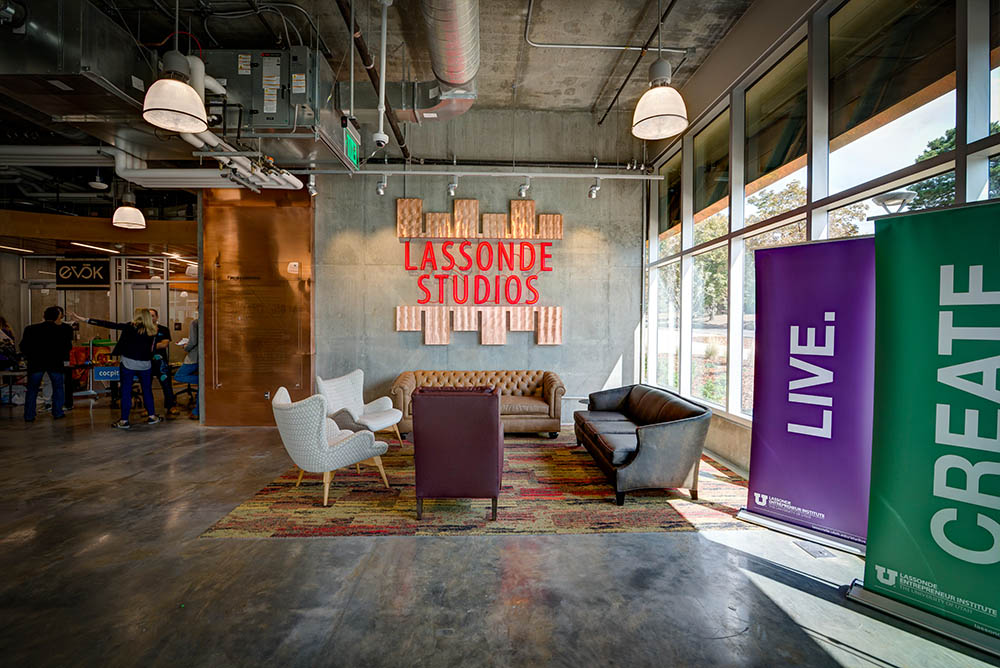 Lassonde Studios at the University of Utah houses hundreds of student founders across five stories of maker space, prototyping labs, and pitch rooms, serving as the physical home of the Lassonde Entrepreneur Institute that partners with the Master of Business Creation program.
